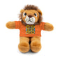 Plush lion toy wearing an orange shirt with a colorful pattern on a white background